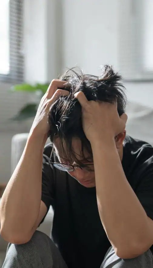 Image of upset man because of erectile dysfunction symptoms Newcastle-under-Lyme