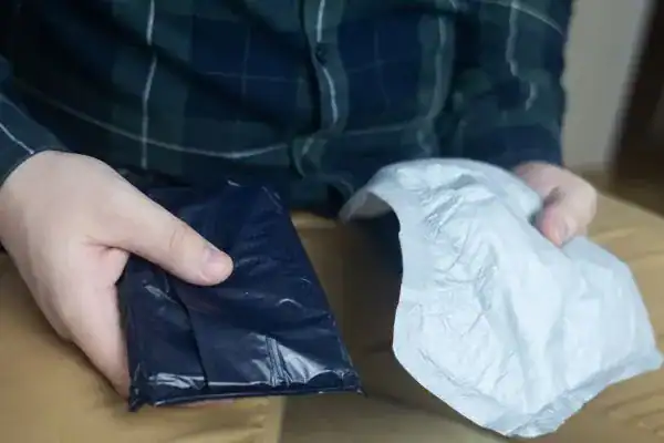 image of man holding stool incontinence Newcastle-under-Lyme products